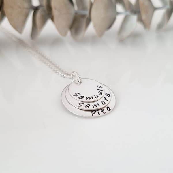 Triple stack of personalised sterling silver discs